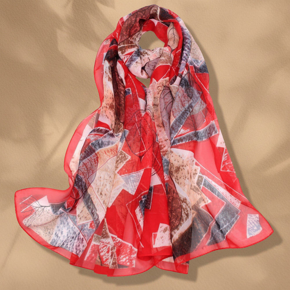 A red silky scarf with a geometric pattern displayed on a white background.